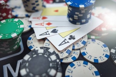 Live Texas Hold'em Bonus table with multi-camera studio feed showing dealer and community cards